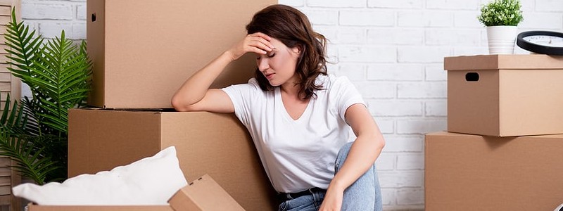 young woman looking stress about her house relocation